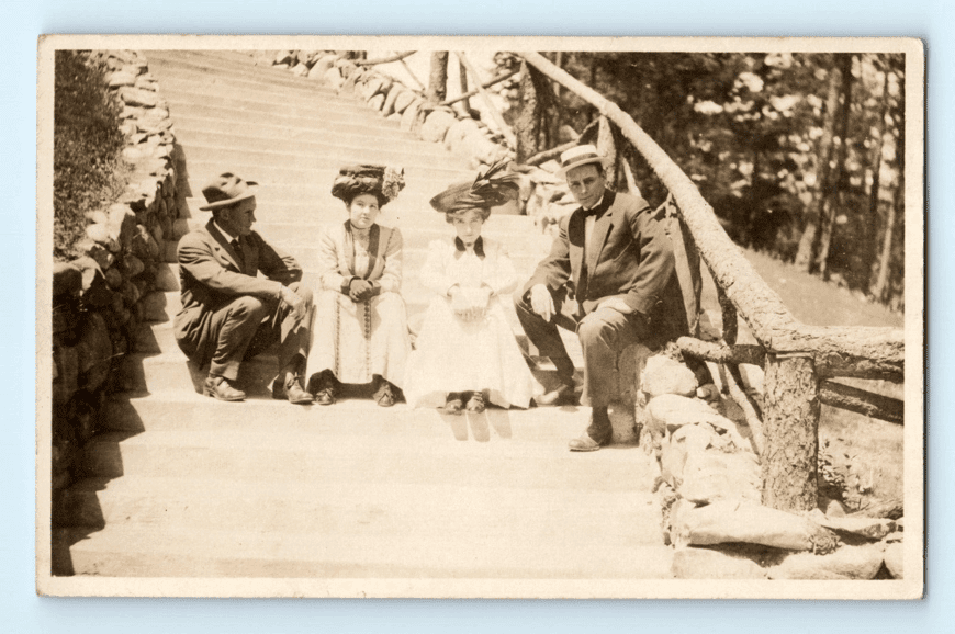 Real Photo Postcard 2 Women Wearing Large Fancy Hats 2 Men - Velox RPPC